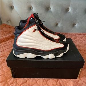 JORDANS PRO STRONG BG’ BLACK VARSITY RED SHOES